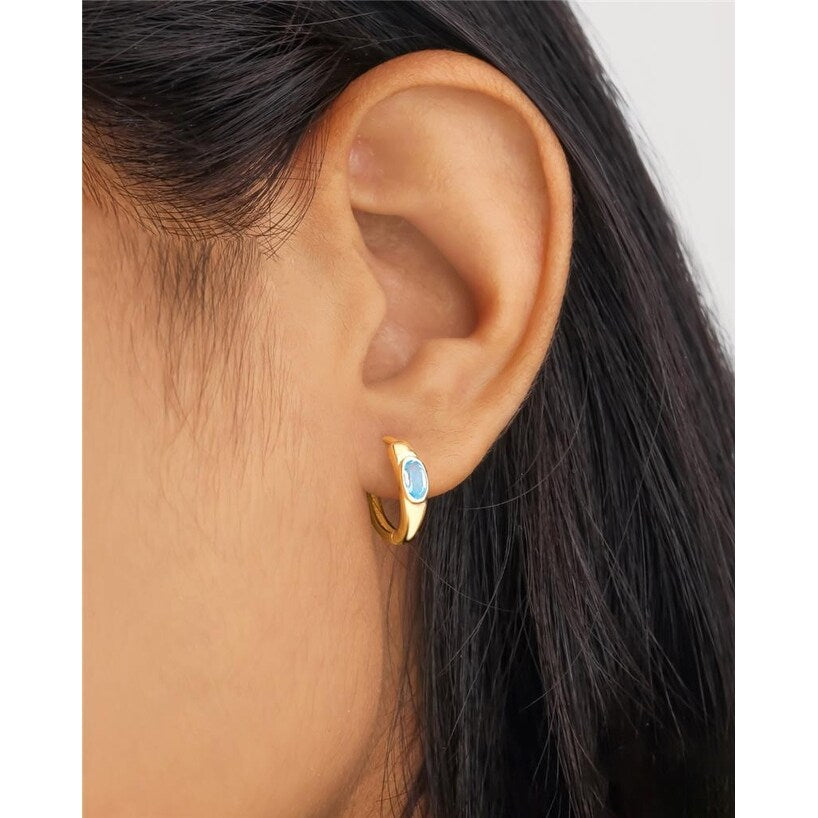 Premium YS Gems Gold Plated Hoop Earrings with Sky Blue Topaz